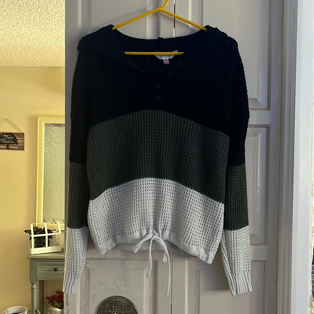 Women’s black, green, and white knit sweater